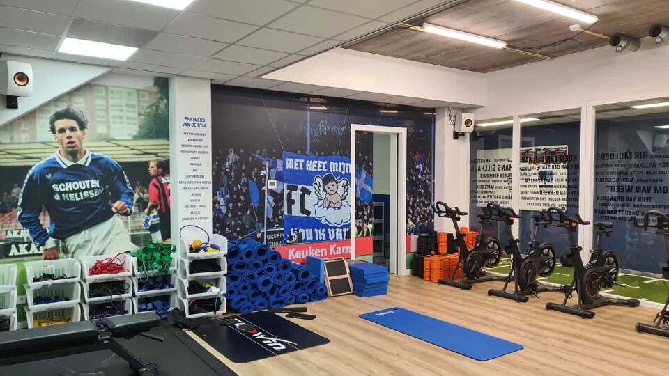 Ontwerp voor een bedrukte wandvisual in een voetbalkantine